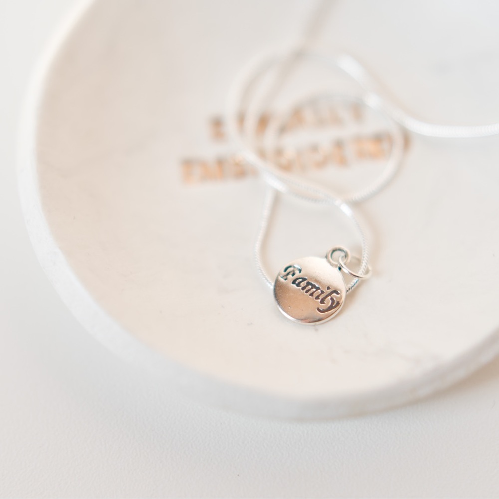 22 inch silver necklace with family charm